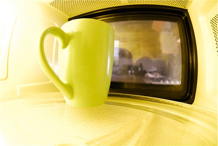 Picture Of Yellow Mug In Microwave
